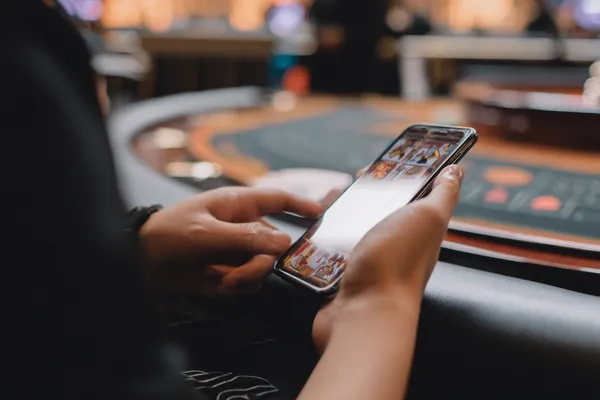 ILOTBED Jackpot Slots — Spin for massive rewards A dramatic shot of winning sevens landing on a slot reel surrounded by shining gold coins, symbolizing big wins.